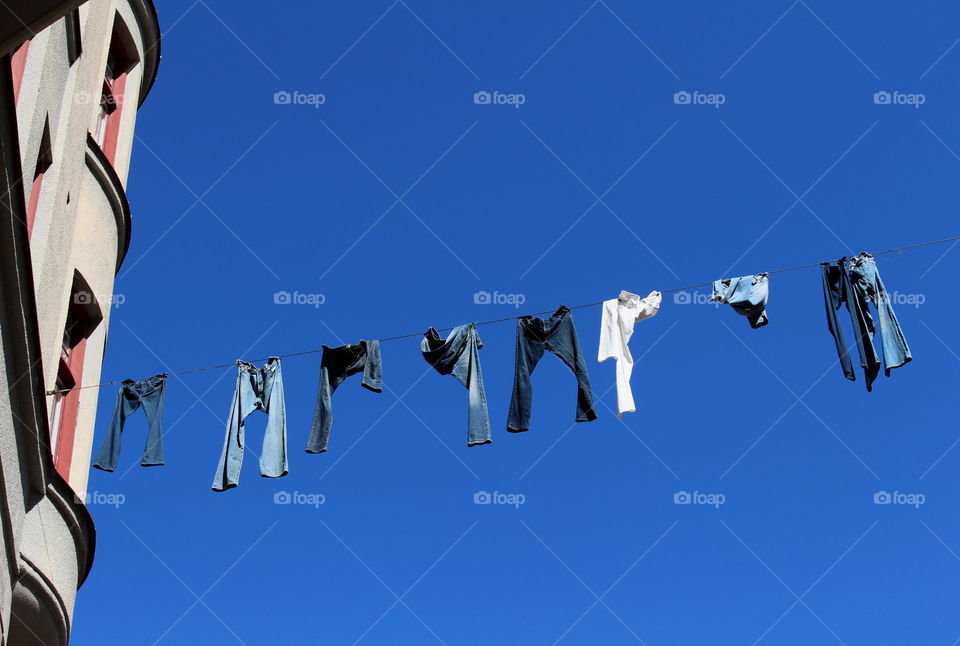 City laundry, jeans clothesline.