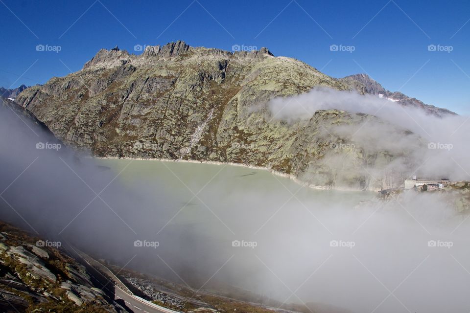 Scenic view of clouds and rock formation