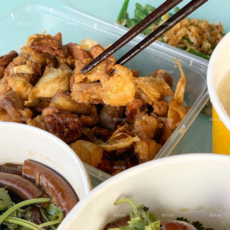 Teo chew bak kut Teh with fried chicken garlic, French beans with hae bee hiam, pig trotters and intestines meal