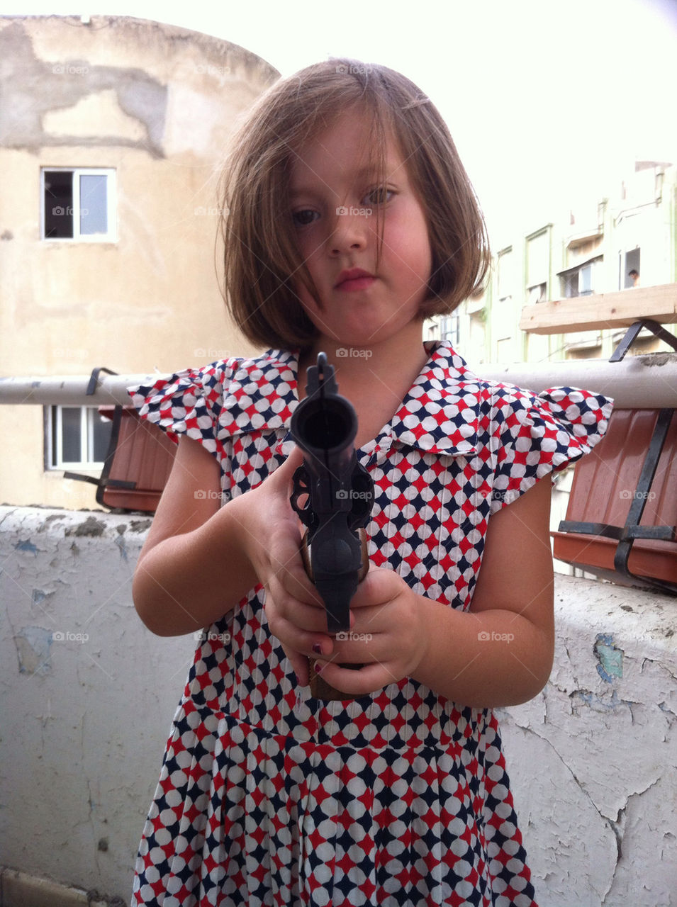 A girl with a gun