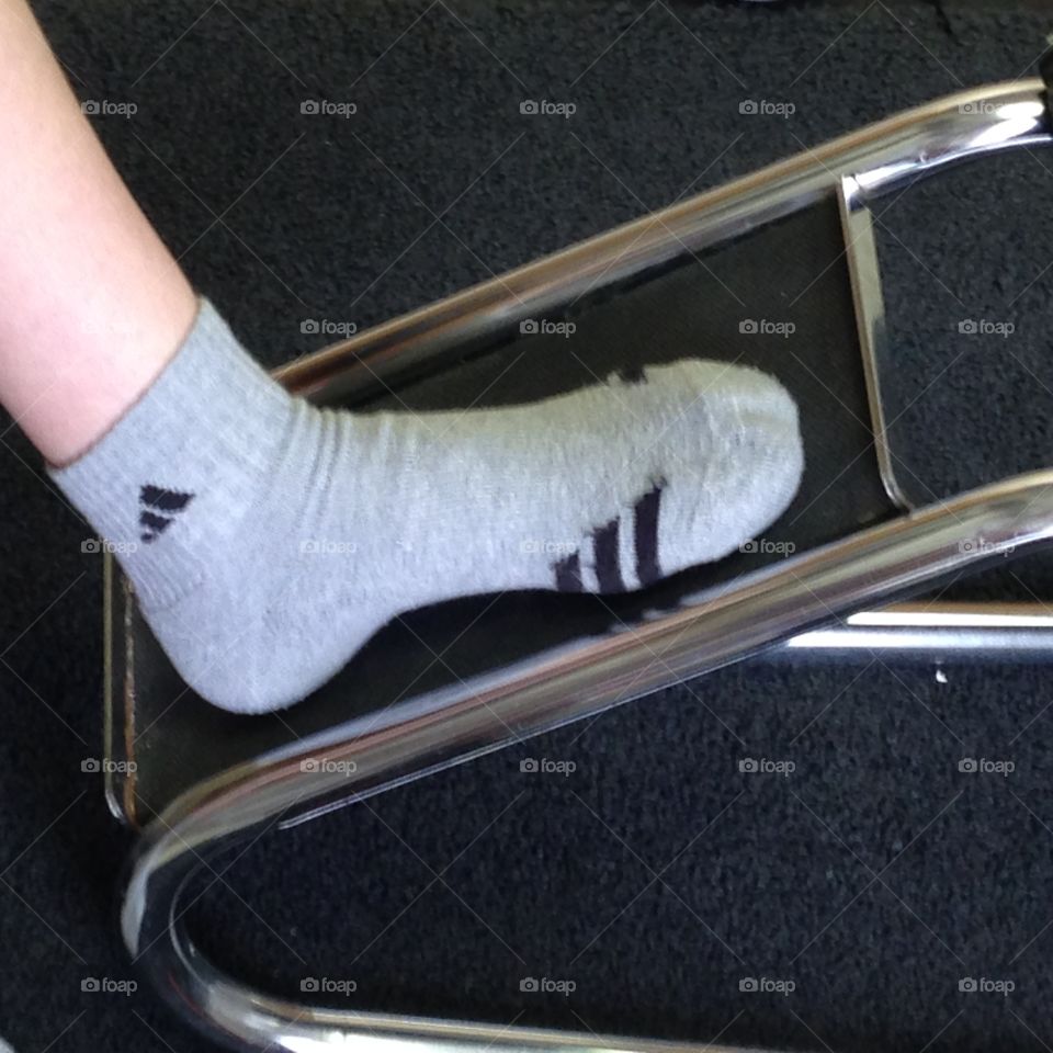 Resting foot while waiting on new shoes