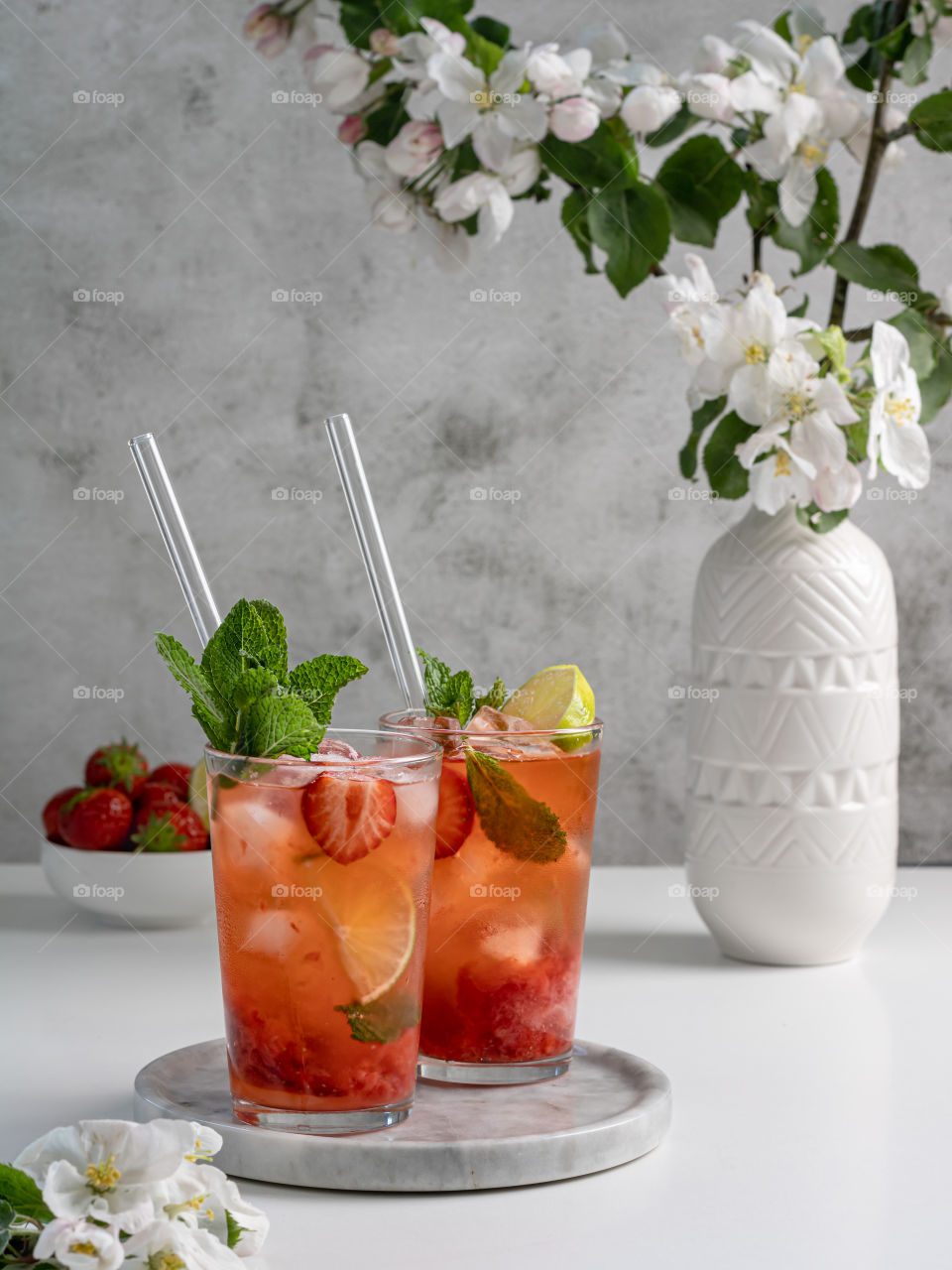 Two glasses of strawberry mojito 