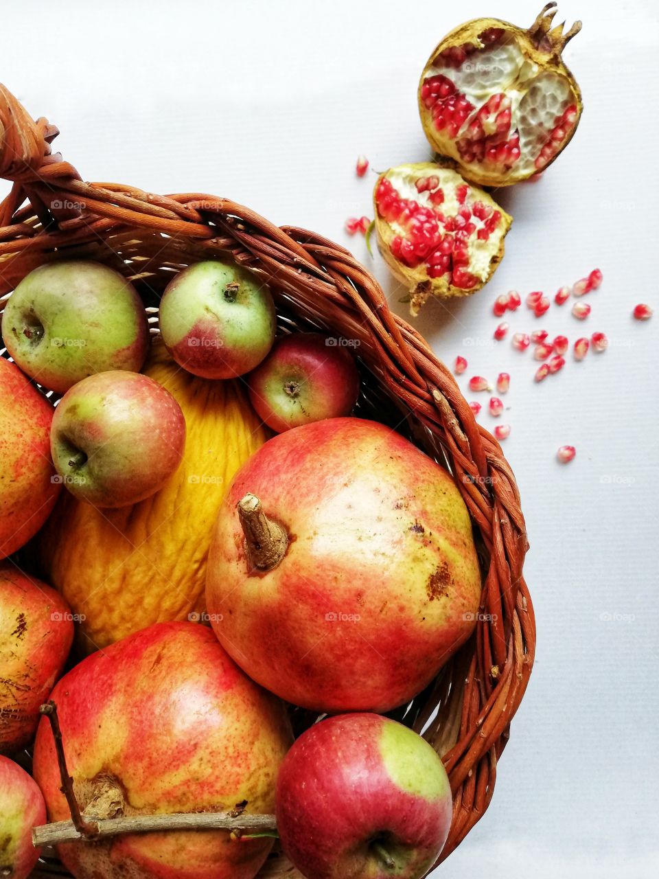 Wicker basket with autumn fruit