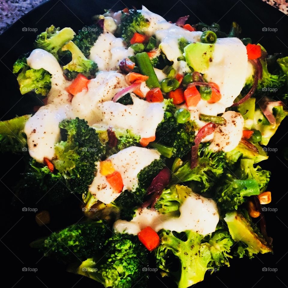 Delicious broccoli with melted mozzarella cheese