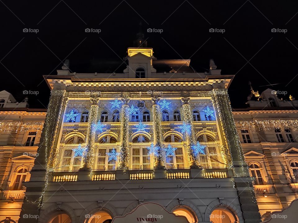 Novi Sad city hall with blue stars night decoration