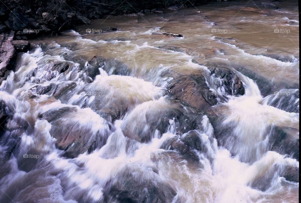 Rushing water over rocks