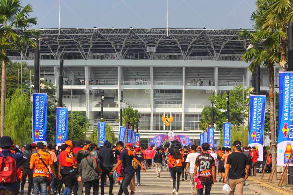 to the stadium where the victory