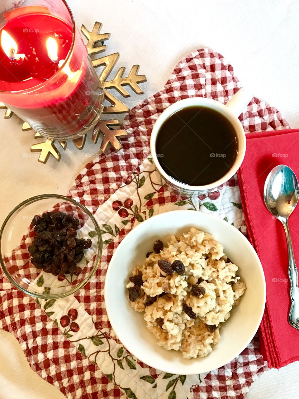 Oatmeal with raisins on red