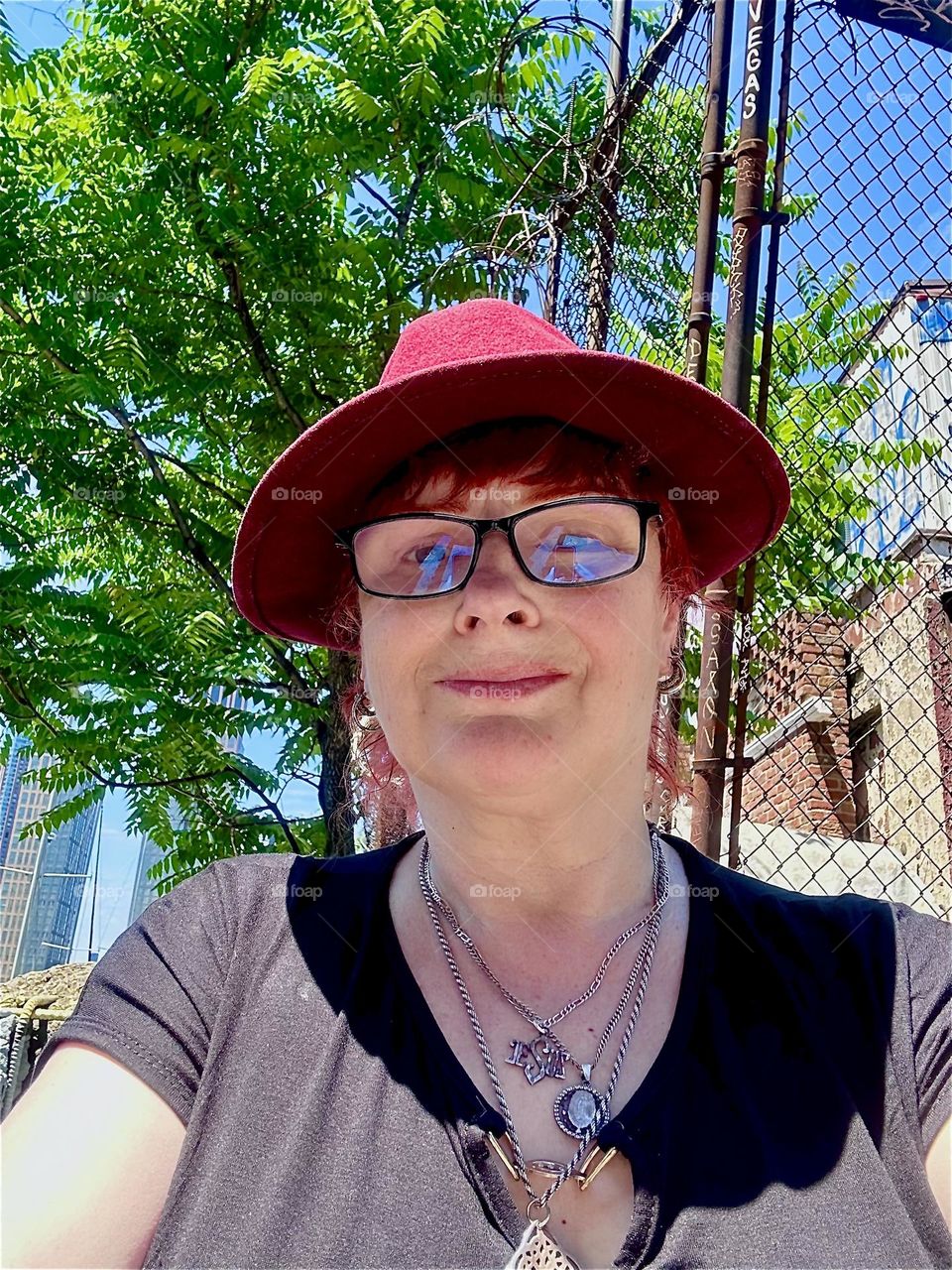 This is me, “Petra Schiller” a.k.a. “Maxine Firefox” standing in the parking lot by the “Pulaski Bridge” at “Newtown Creek” in LIC, Queens on a sunny day in early June 2024. Hypnotic Productions