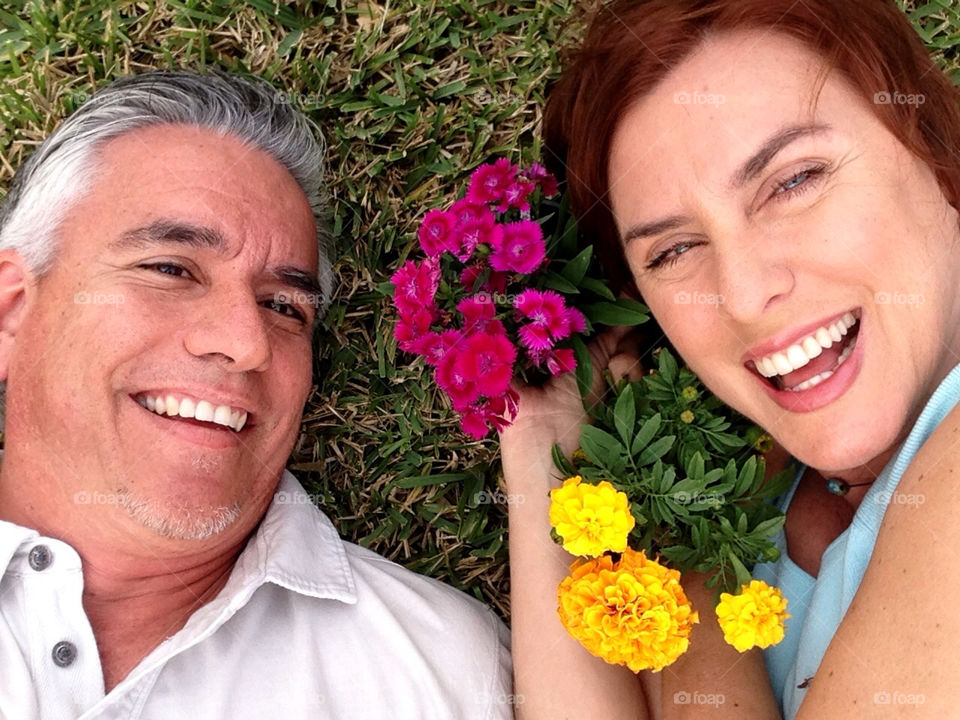 Couple with flowers in garden