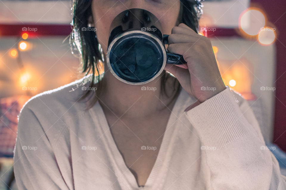 Girl drinking coffee in the morning