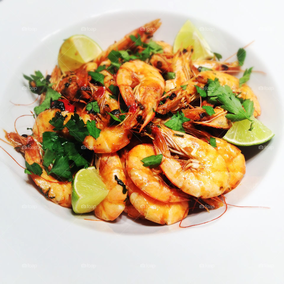 shrimp fried in olive oil with chilli, coriander and garlic