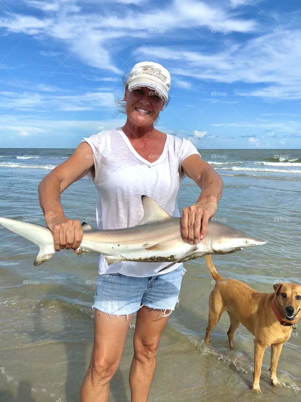 Editor’s choice! Went fishing for redfish and Penny and I caught a baby black-tip shark! 🦈