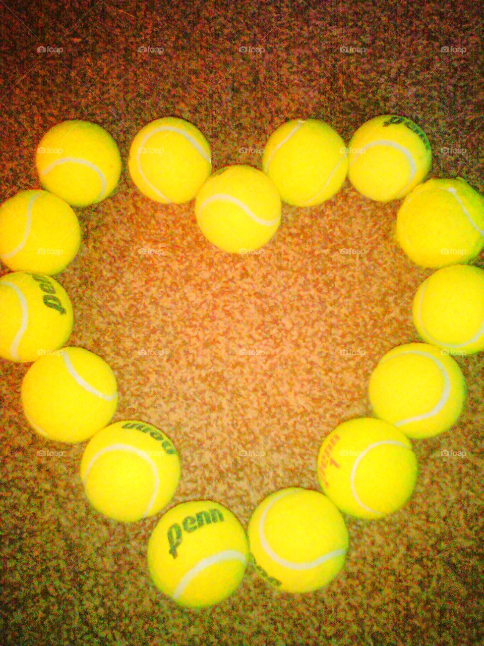 tennis ball heart. made this before the dog grabbed his tennis balls. he loves to play with them.