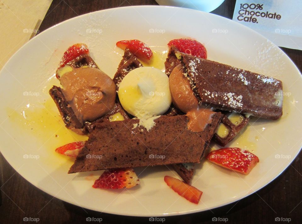 Chocolate Crepes and Waffles Dessert with Ice Cream and Fruit at Meiji 100% Chocolate Cafe, Tokyo, Japan