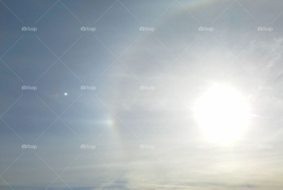 Sun Dog and Halo Around Sun in Sky Over Santa Fe, New Mexico. Unique Natural Phenomena. Bright Sky. Rainbow.