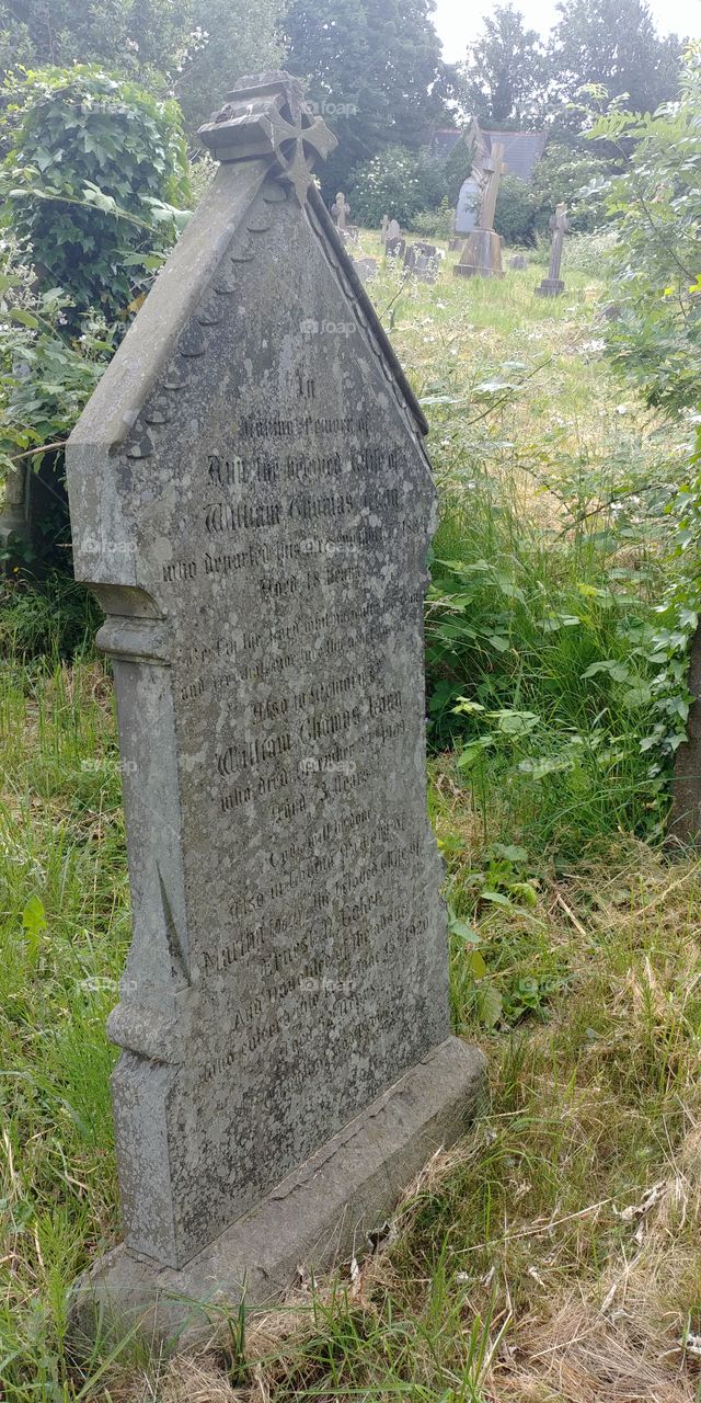 old victorian gravestone in graveyard