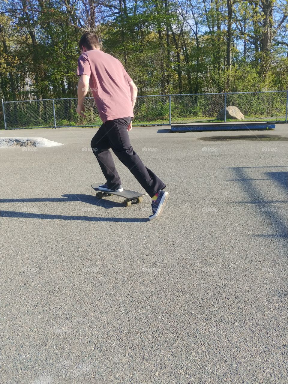 i was setting up for my next trick at the skatepark.