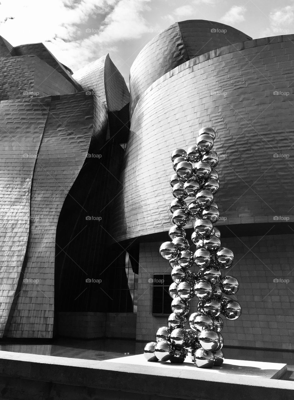 A black and white picture of Guggenheim museum in Bilbao, Spain 