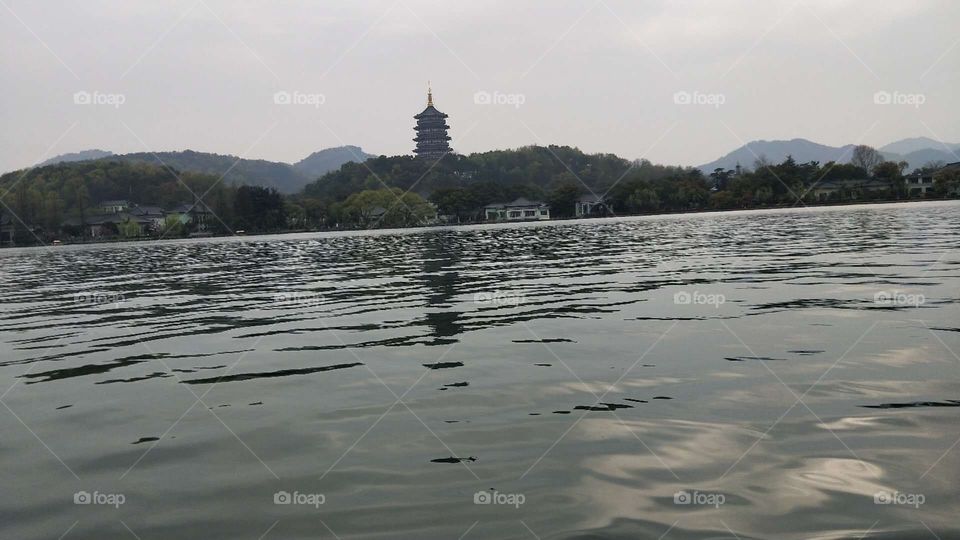 Leifeng Pagoda is a five-storey tower with eight sides, located on Sunset Hill south of the WestLake in Hangzhou, China. Originally constructed in the year AD 975, it collapsed in 1924 but was rebuilt in 2002.