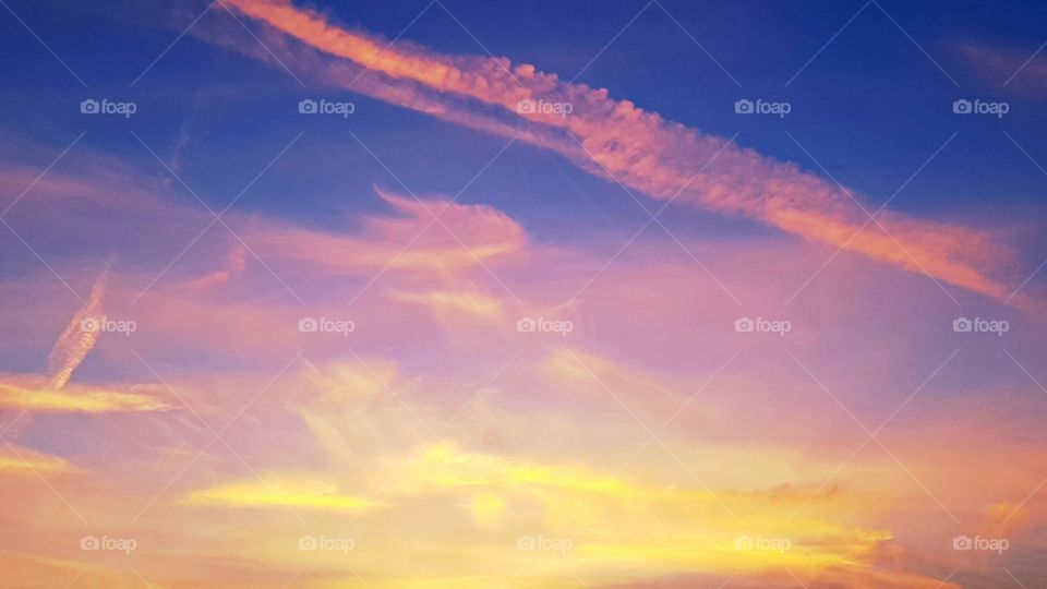 sky with orange, yellow and pink clouds