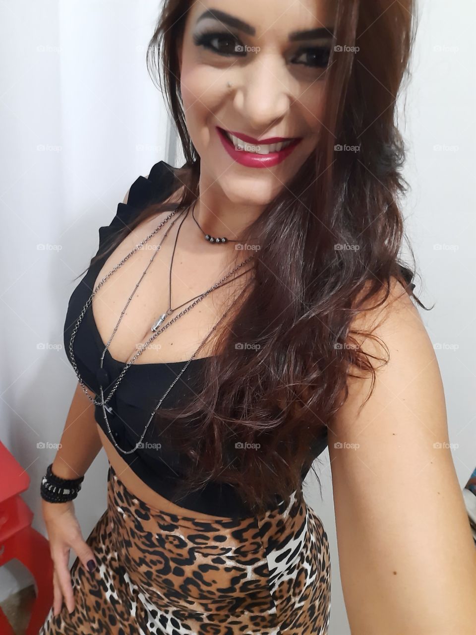 smiling and happy woman in animal print clothes