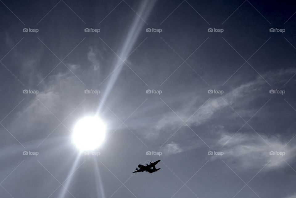 Low flying military transport plane