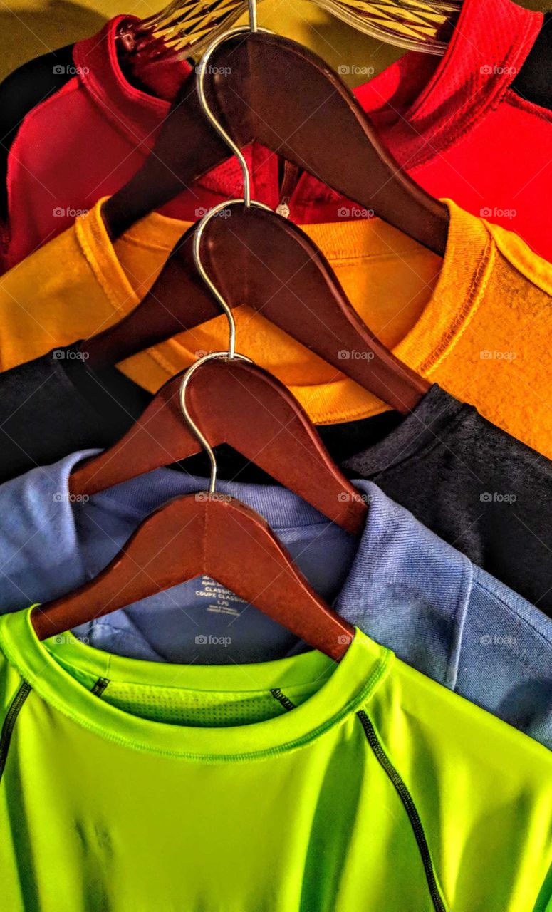 prism of colors hanging in a closet