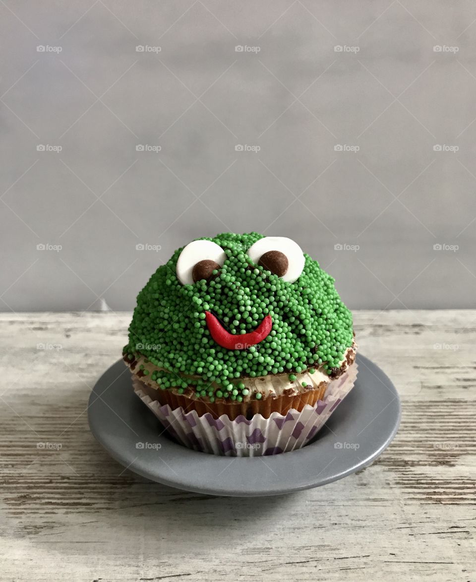 Christmas cupcake on table