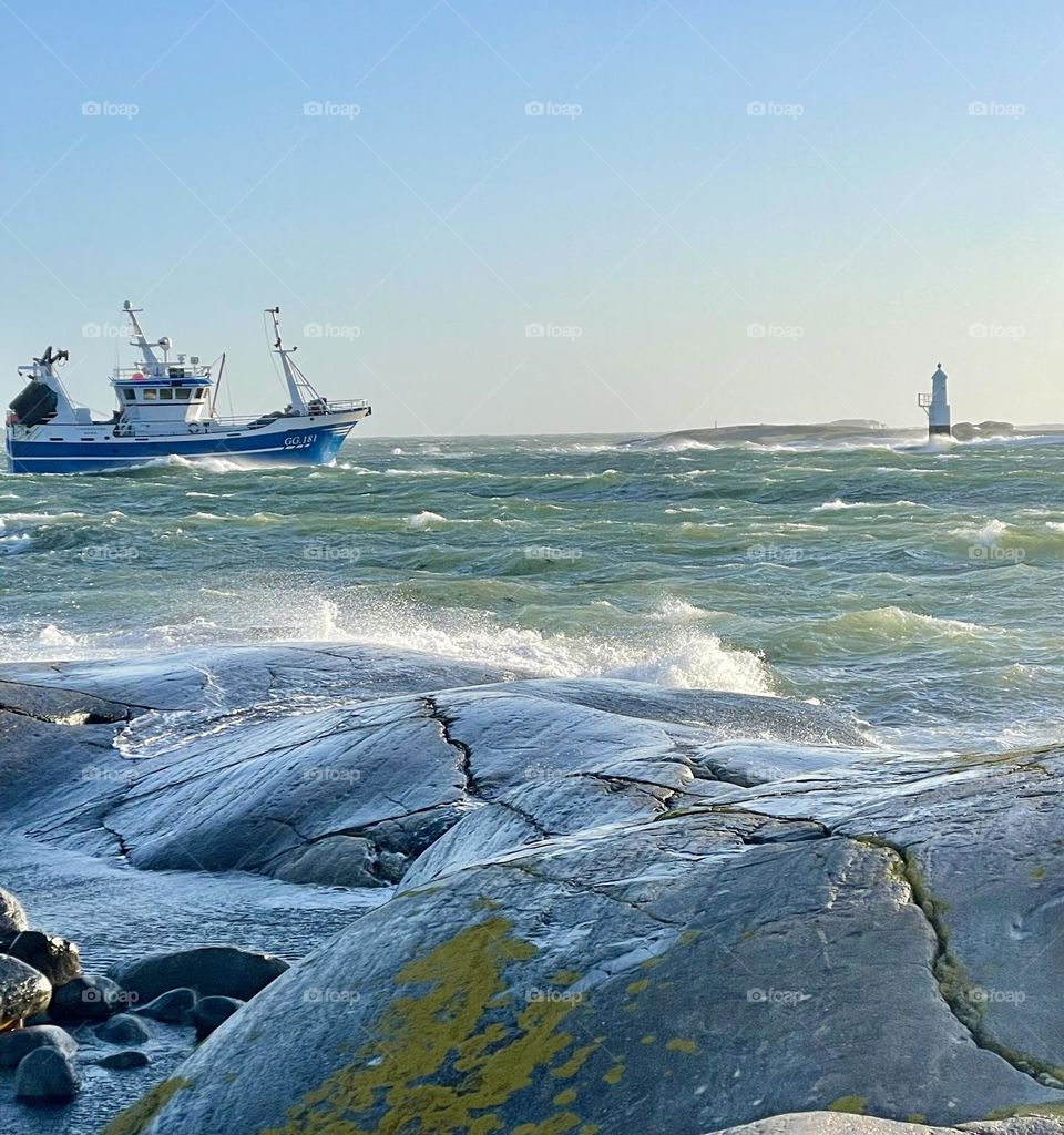 A fishingboat is on the way out for fish fishing and fishing in 