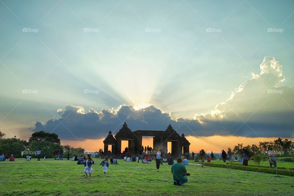 enjoying sunset view in ratu boko archaelogical, near Jogjakarta, Indonesia