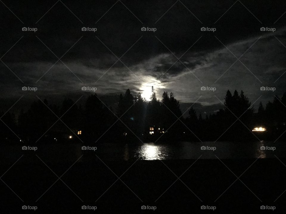 Large moon reflection on the lake. 