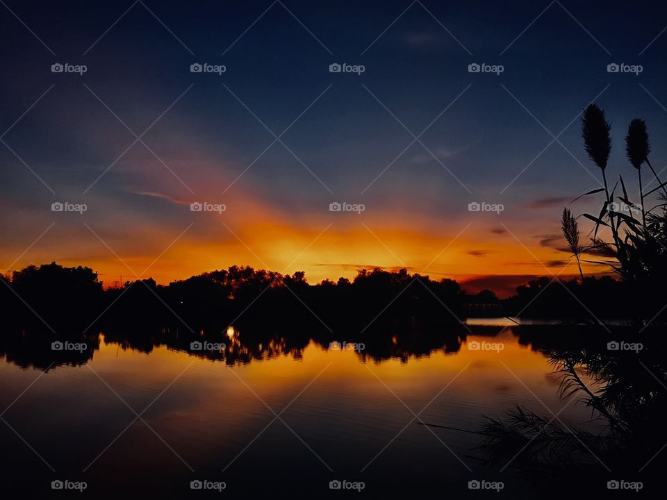 The Rays of the Sun are Fighting back the night. The Twilight is Capturing the Scene and Night will Follow. 