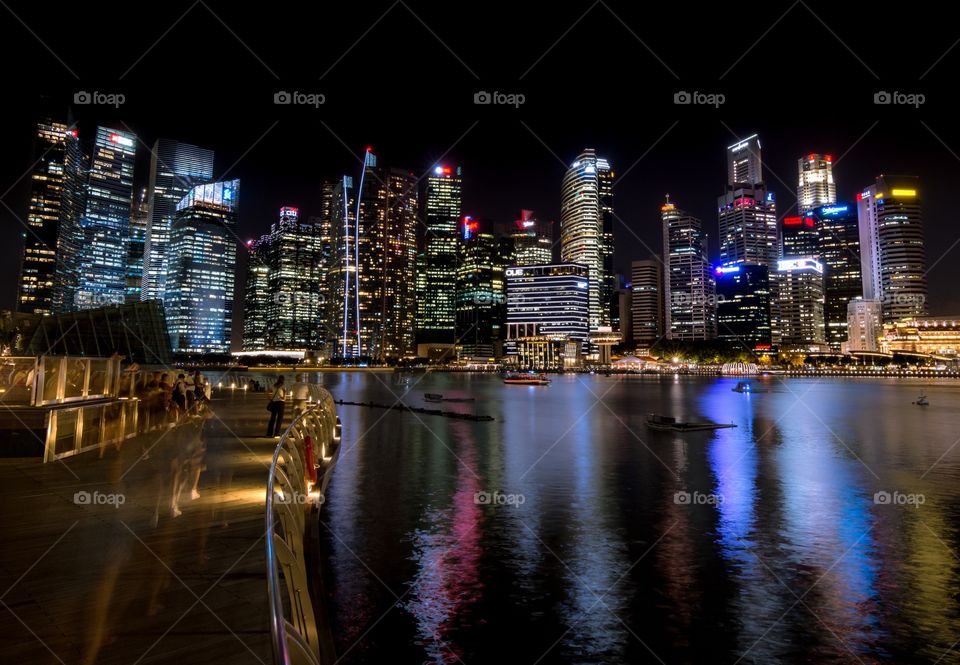 The city lights of the business district of Singapore taken from Marina Bay Sands. 