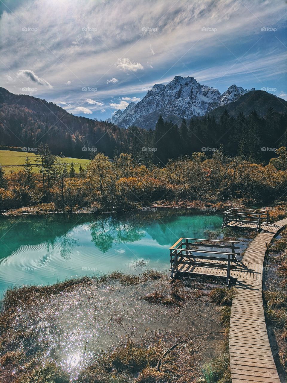 Scenic view on the mountains against the blue slovenian lake.