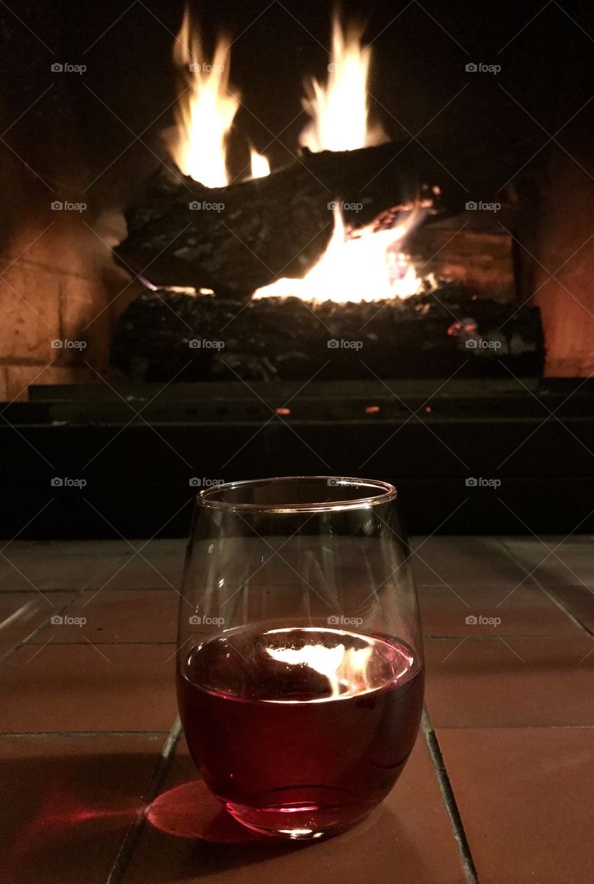 Red wine by the fireplace makes for a relaxing evening.