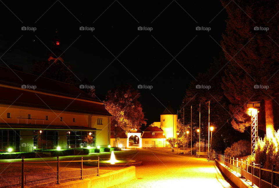 a palace entrance at night