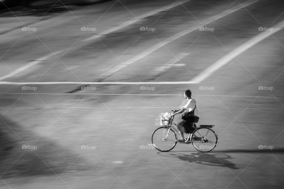 A Man with Bicycle