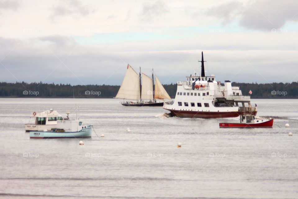 3 masted schooner and the ferry