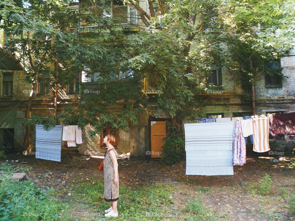 girl in the old courtyard of the city of Kiev