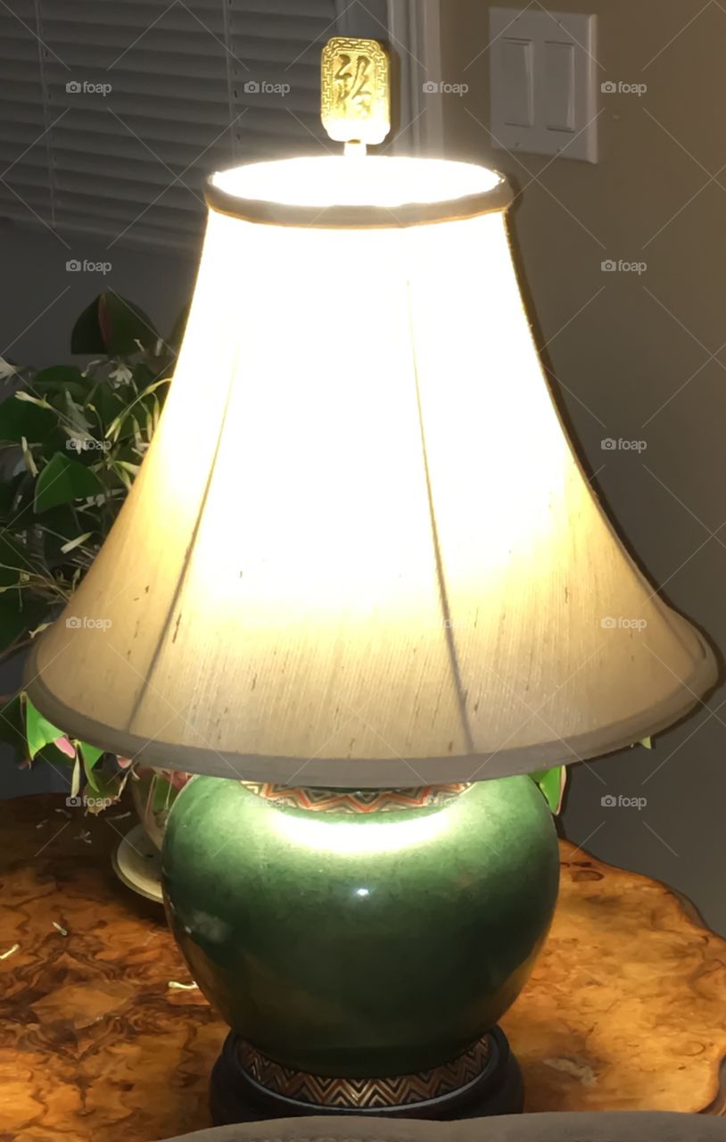 Oriental
Lamp on antique wood table lamp is on