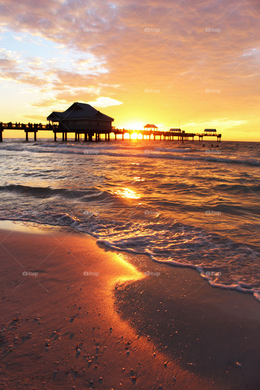 Silhouette of pier during sunset