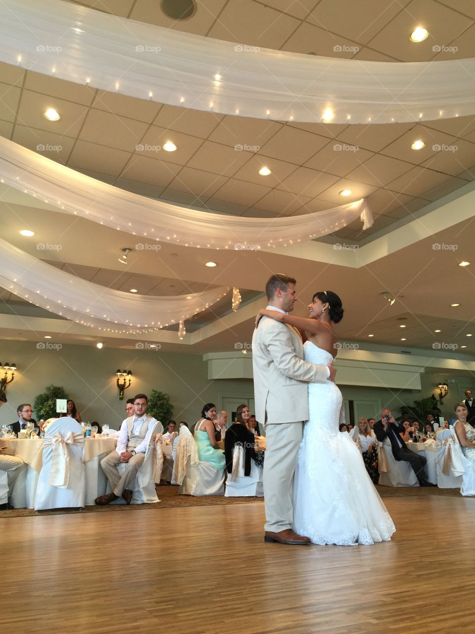 Wedding. Bride and groom dancing in a party