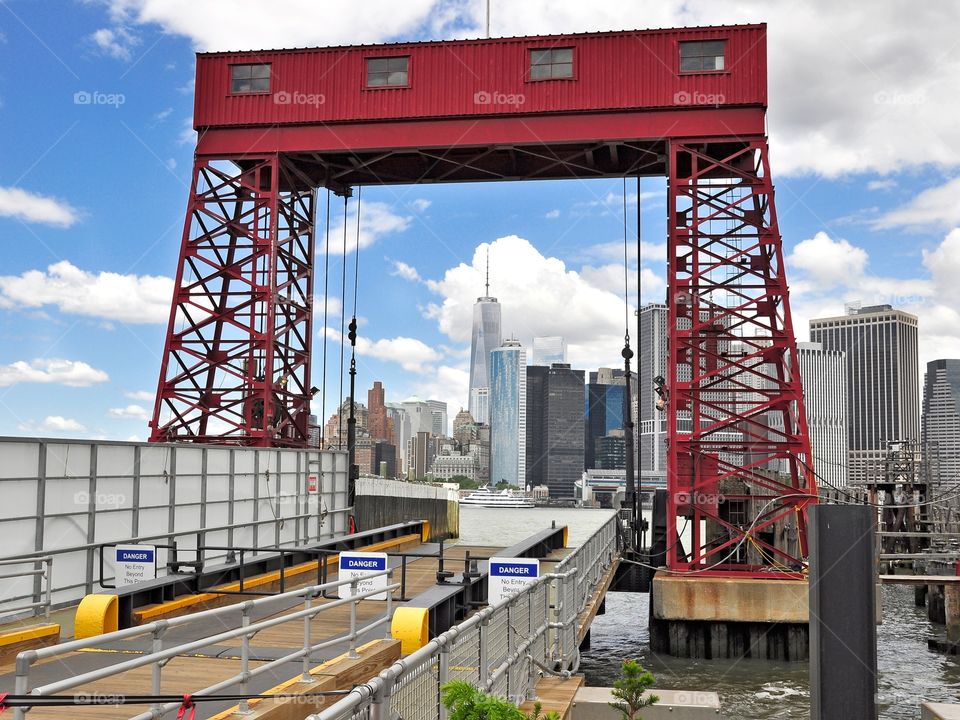 A view from Governor's Island. Freedom Tower & Lower Manhattan framed from across the river at Governor's Island loading dock. 
Zazzle.com/Fleetphoto 