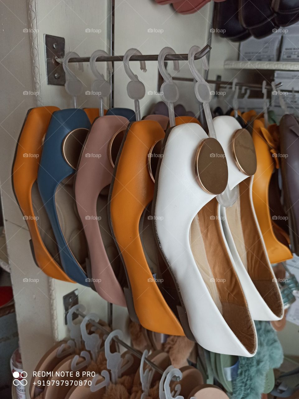 Beatiful Colorfull shoes in display at a Shoe Room....