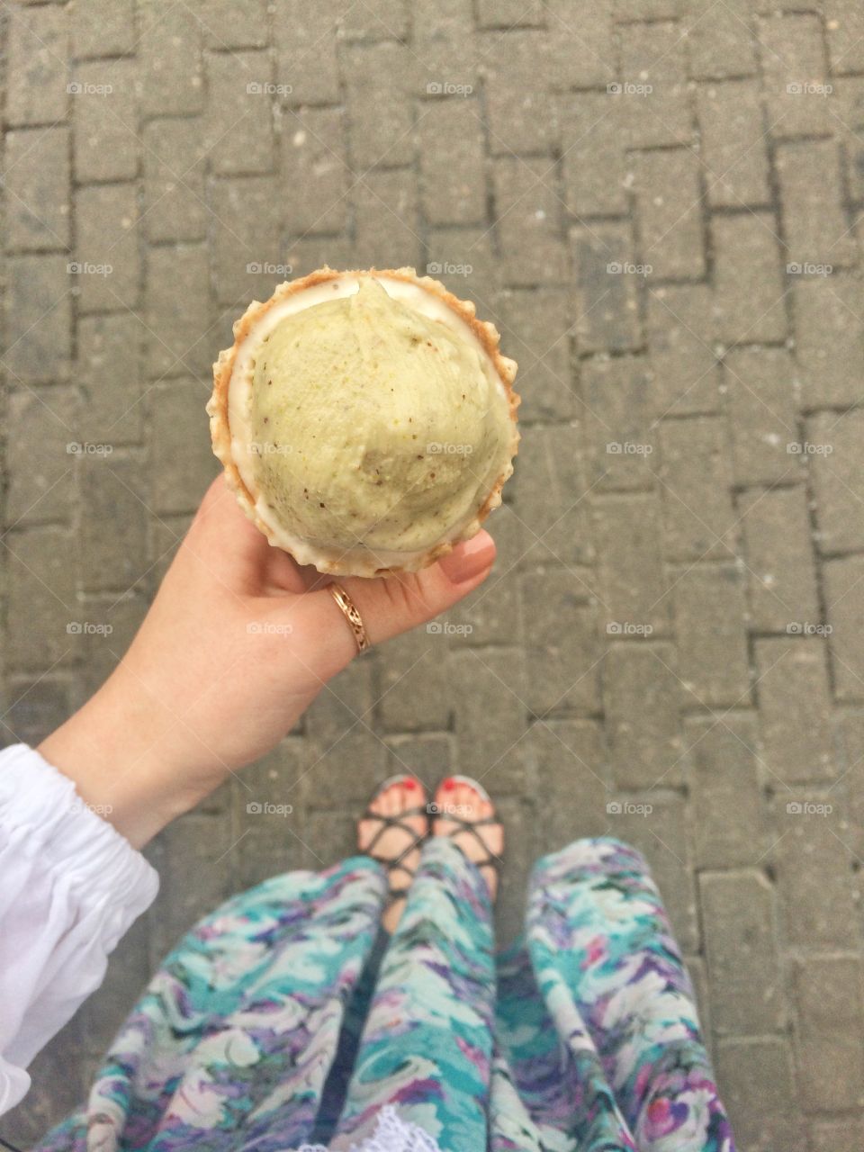 Women holding ice cream cone