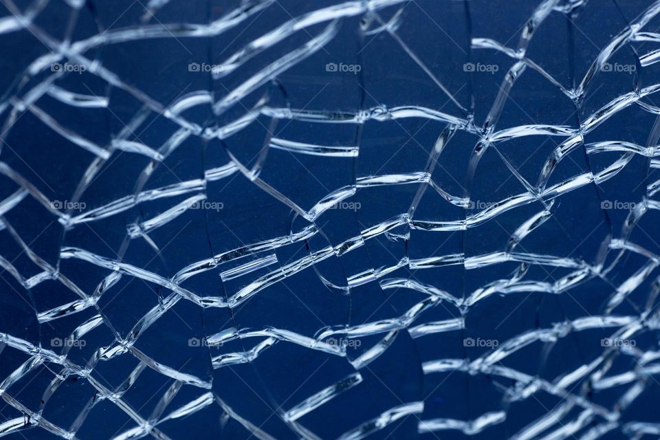 Blue cracked window glass damage situation be careful abstract background