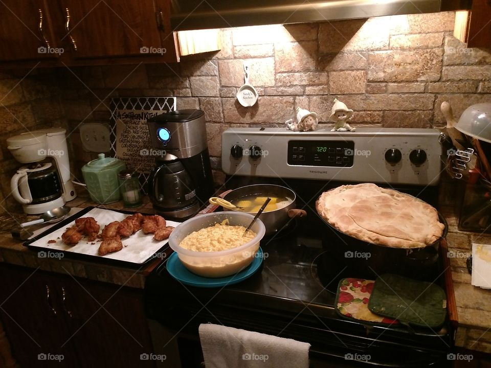 country cooking, homemade chicken pot pie, corn on the cob, macaroni and cheese, fried chicken breast