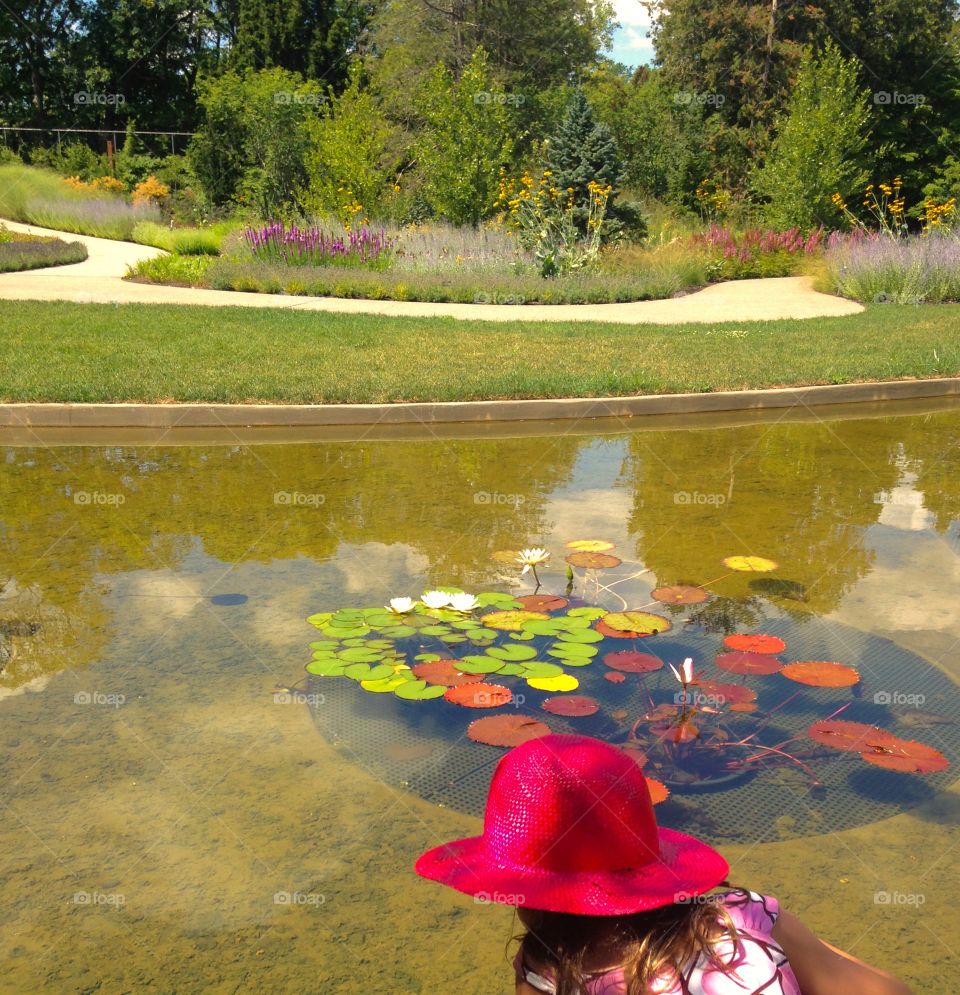 Girl at the pond