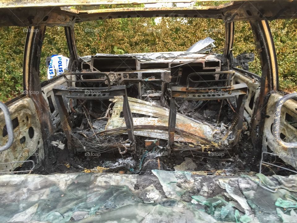 burned-out car in Sweden.